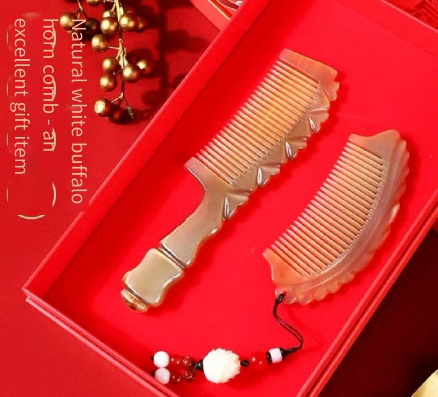 Cow horn comb 520 gift for girlfriend gift birthday gift female exquisite haute sense wife Valentine's Day practical gift